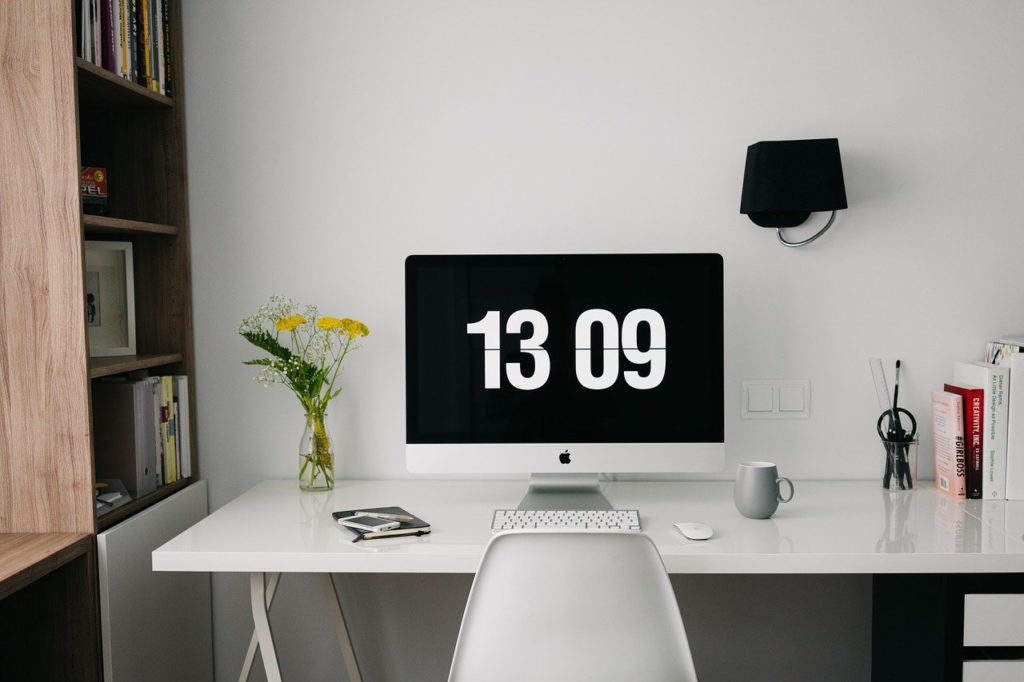 Clock on Computer Screen in Home office